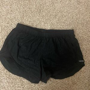 black Calvin Klein athletic shorts